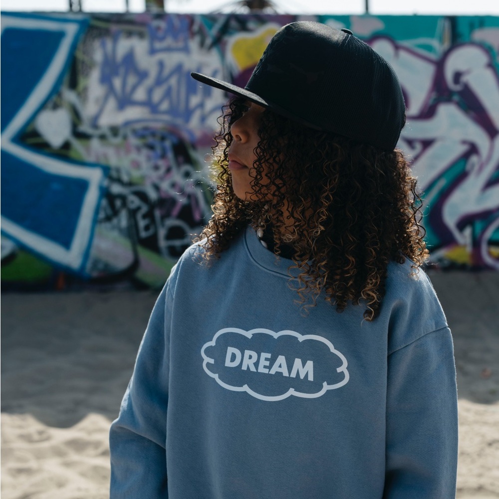 Kids “DREAM” sweatshirt in pacific blue.